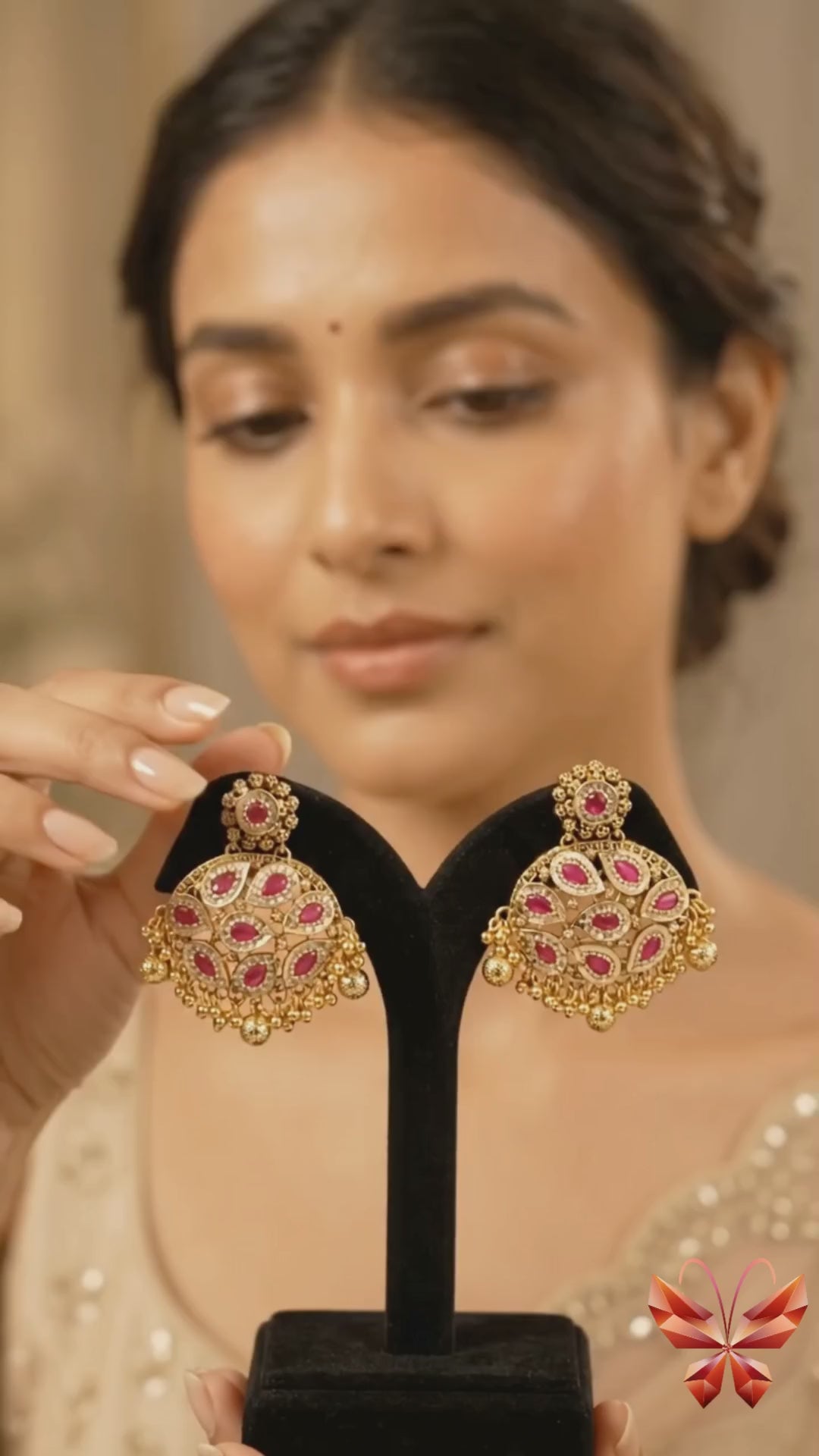 Rajrani Ruby Jhumka styled as statement Indian festive earrings
